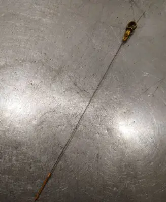 Oil level dip stick