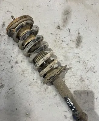 Mitsubishi Pajero Front shock absorber with coil spring
