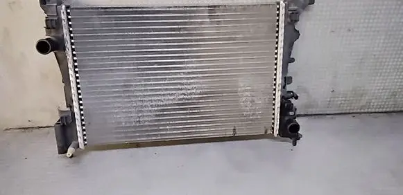 Opel Corsa D Coolant radiator 13249566