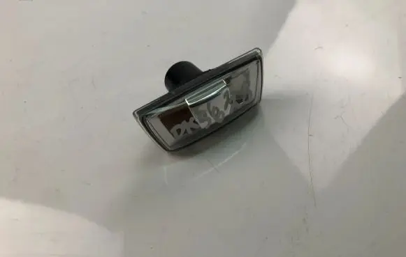 Opel Astra H Front fender indicator light 13228580