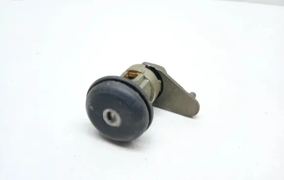Ford Escort Front door lock (next to the handle) 