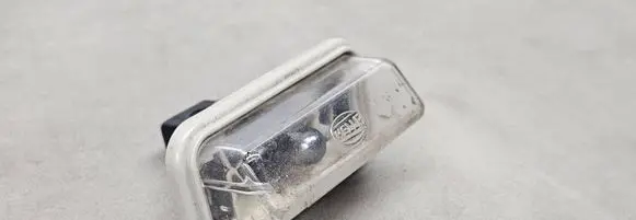 Toyota Avensis T250 Number plate light E1001479
