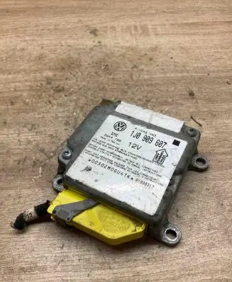 Volkswagen PASSAT B5 Airbag control unit/module 1J0909607 5WK4199