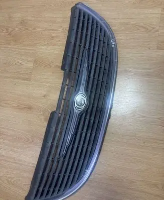 Chrysler Voyager Front bumper upper radiator grill 4857522 4857522AA