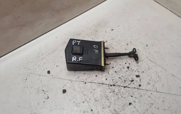 Front door check strap stopper
