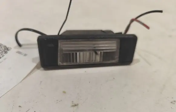 Nissan Juke I F15 Number plate light 26510JD00A