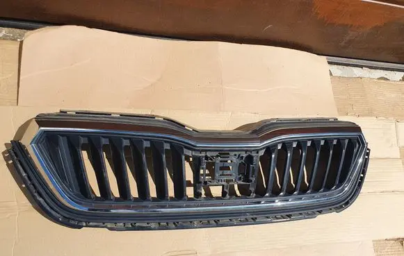 Skoda Scala Front bumper upper radiator grill 657853653