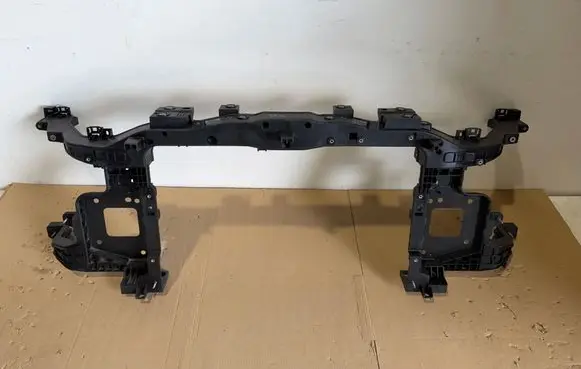 Hyundai Kona II Radiator support slam panel 64101HF000