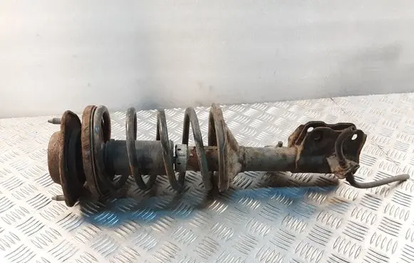 Mitsubishi Carisma Front shock absorber with coil spring