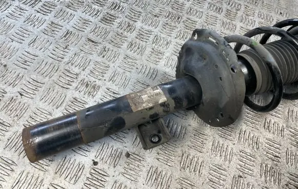 Volkswagen T-Cross Front shock absorber with coil spring 2Q0413031DL