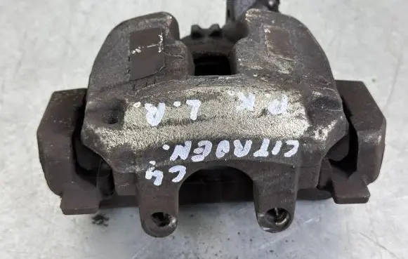 Citroen C4 SpaceTourer Front brake caliper 9810992180
