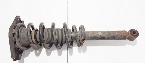 Nissan Primera Rear shock absorber/damper 562103a011
