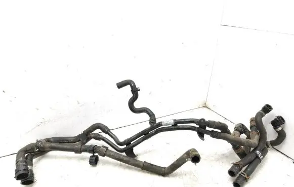 Volkswagen Golf VII Engine coolant pipe/hose 5Q0121065H 5Q0121049AT