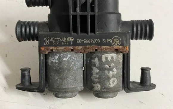 Coolant heater control valve