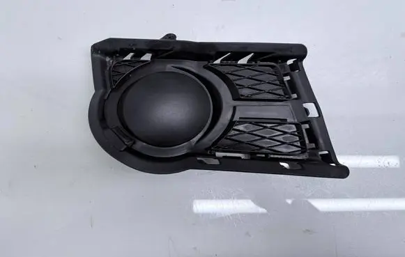 Volkswagen Tiguan Front fog light trim/grill 5N0853666