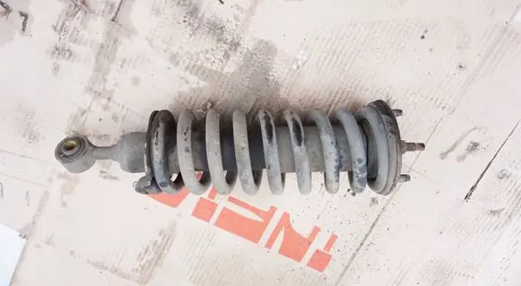 Nissan Navara D40 Front shock absorber with coil spring SKO62816