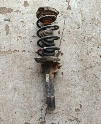 Volkswagen Golf VI Front shock absorber with coil spring