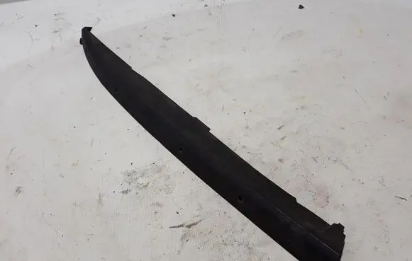 Engine bonnet/hood lock trim molding