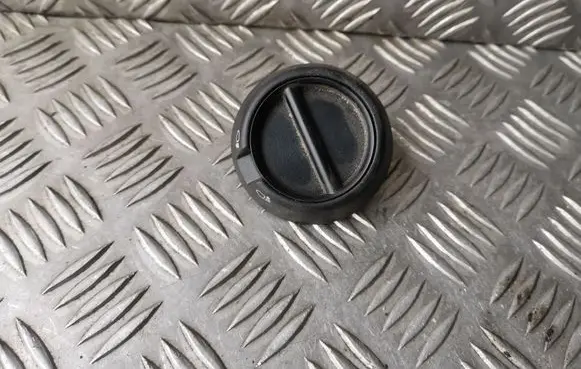 Headlight level height control switch