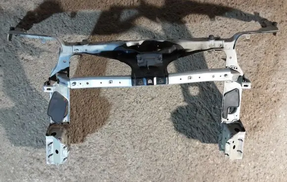 Radiator support slam panel