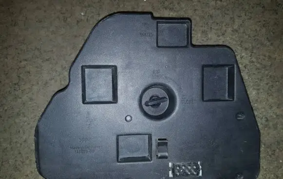 Tail light bulb cover holder