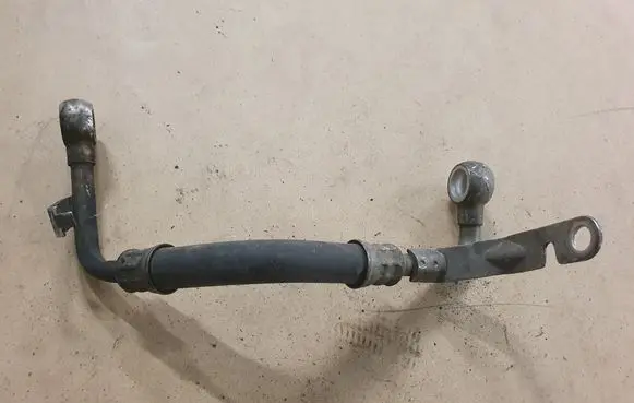 Volkswagen Golf V Engine coolant pipe/hose 06F121497E