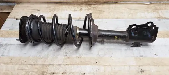 Front shock absorber with coil spring