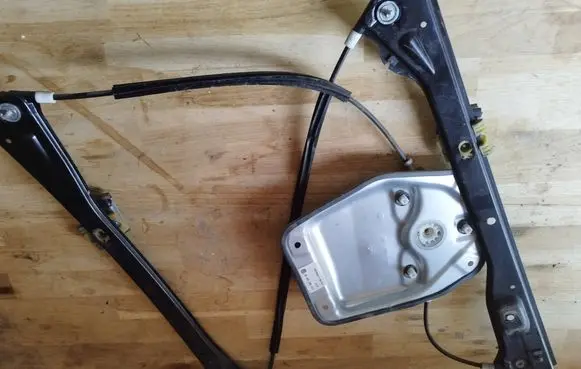 Sliding door window regulator with motor