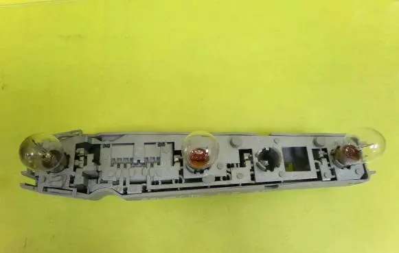 Ford Escort Tail light bulb cover holder