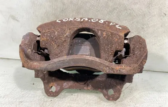 Opel Corsa D Front brake caliper 