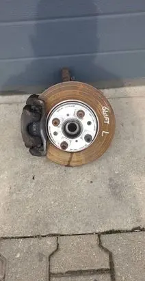 Suzuki Swift I Front wheel hub spindle knuckle