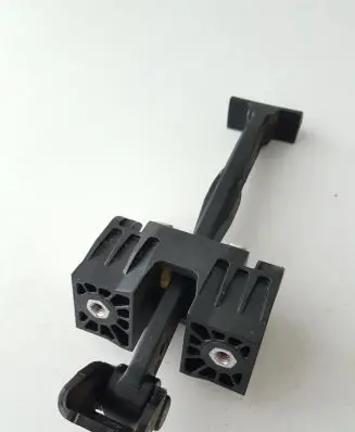 Rear door check strap stopper