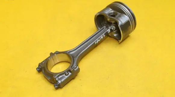 Piston with connecting rod