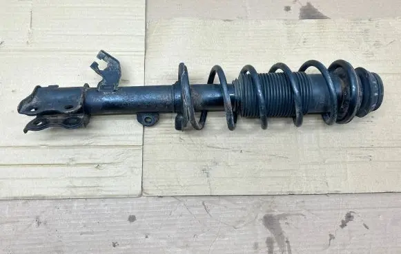 Nissan Note (E12) Front shock absorber with coil spring 54303-3WF0C