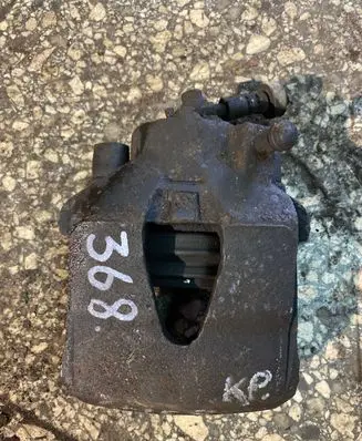 Volkswagen Golf IV Front brake caliper