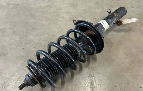 Volkswagen Golf IV Front shock absorber with coil spring 22045744