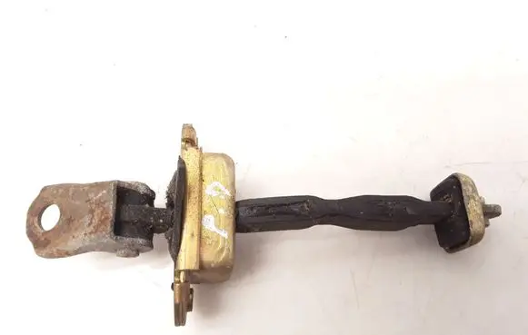 Nissan Primera Front door check strap stopper