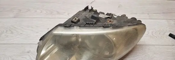 Chrysler Grand Voyager IV Headlight/headlamp 04857831AC