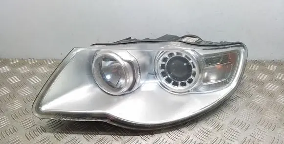 Volkswagen Touareg I Headlight/headlamp 7L6941031