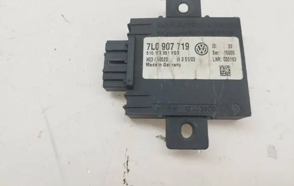 Volkswagen Touareg I Alarm control unit/module 7L0907719