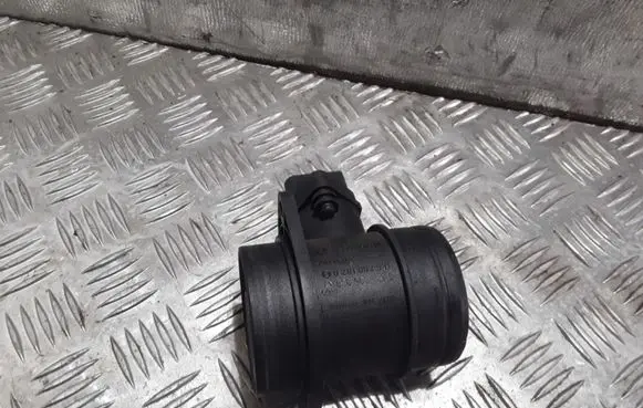 Volkswagen Touran I Mass air flow meter 0281002531 038906461B