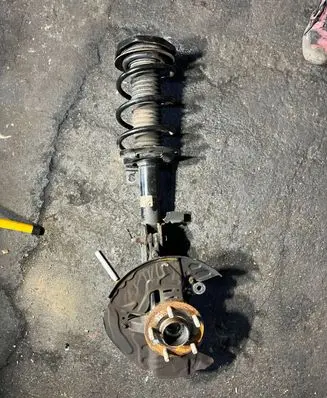 Ford Kuga III Front shock absorber with coil spring 18045EAE