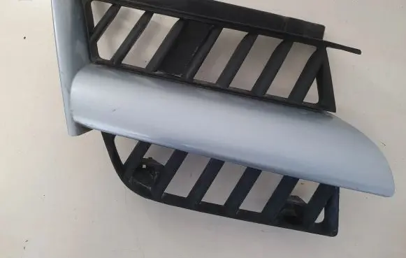 Mitsubishi Outlander Front bumper upper radiator grill MN175978