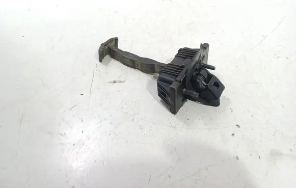Front door check strap stopper