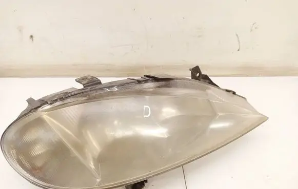 Renault Megane I Headlight/headlamp 7701047180