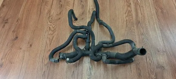 Engine coolant pipe/hose