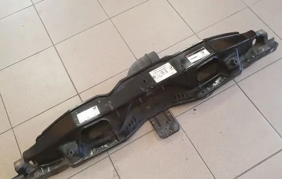 Top upper radiator support slam panel