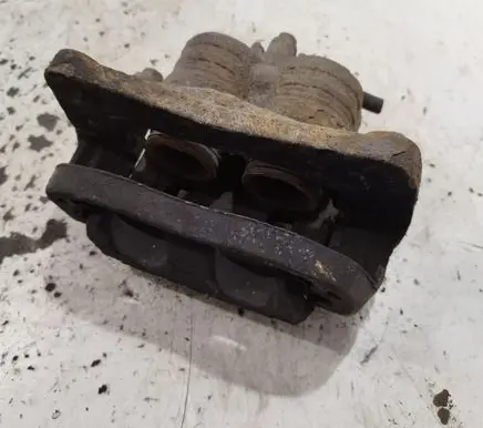 Subaru Impreza III Front brake caliper