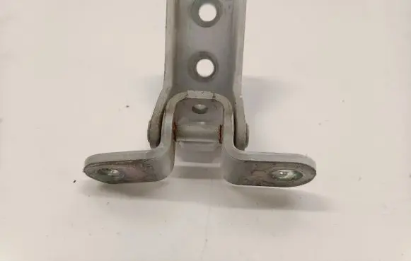 Front door lower hinge
