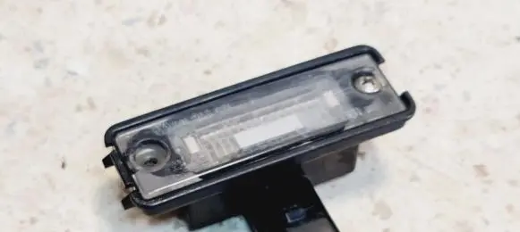 Volkswagen Golf V Number plate light 1J6943021
